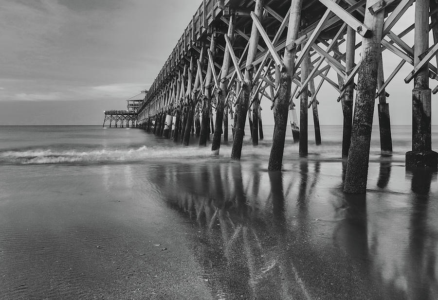 Folly Pier Reflection Black And White Photograph by Dan Sproul