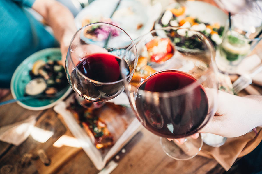 Food and wine brings people together Photograph by VioletaStoimenova