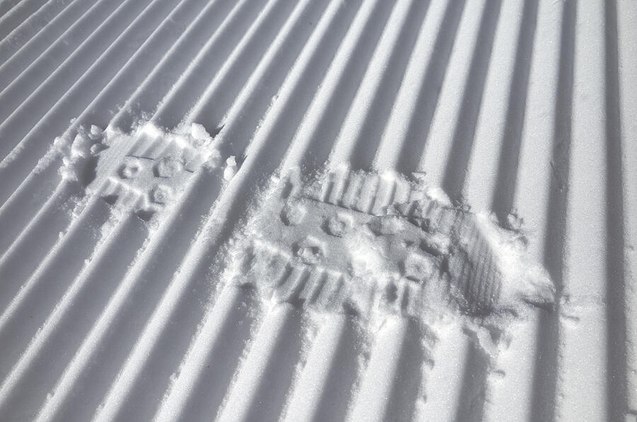 Foot track on the fresh striped prepared slope Photograph by Vladimirovic