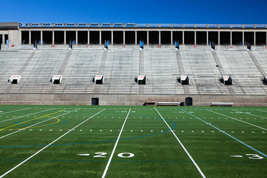 Football field and bleachers Photograph by Pgiam