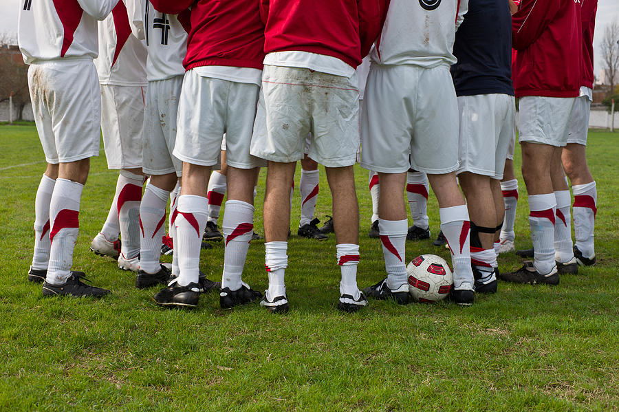 Football huddle Photograph by Shane Korpisto