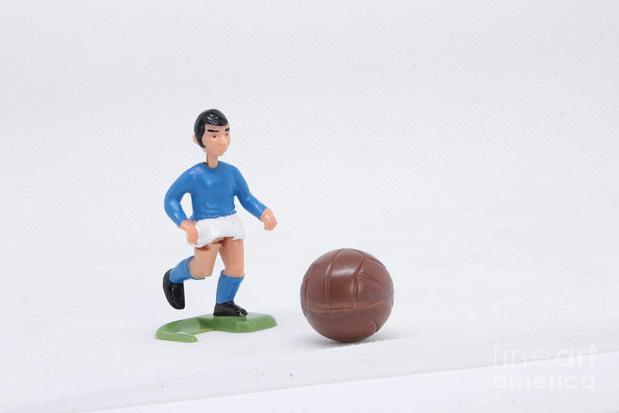 Football Photograph - Football soccer player in blue and white  by Tom Conway