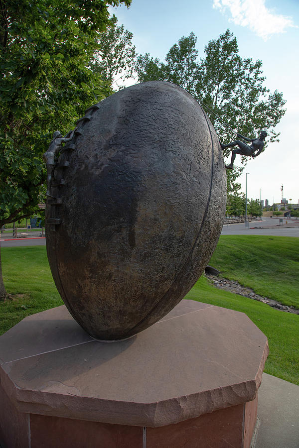 Football statue outside Empower Field at Mile High Stadium in Denver Colorado Photograph by Eldon McGraw