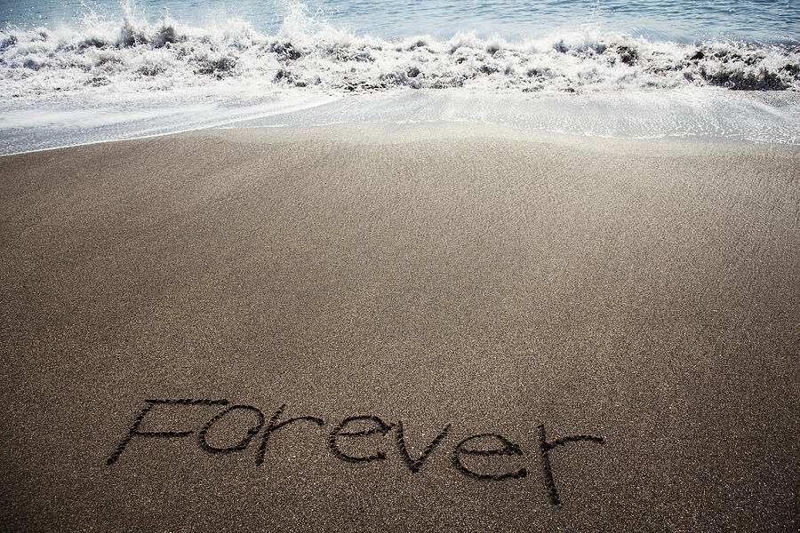 Forever written in sand on beach Photograph by Hiroshi Watanabe