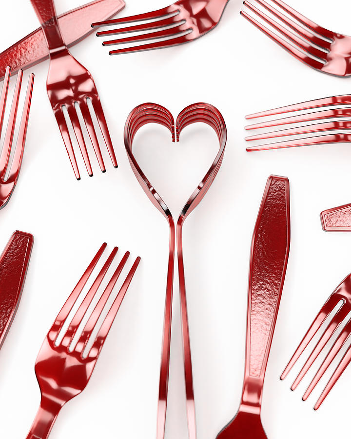 Forks on a white surface depicting a heart Photograph by I Like That One