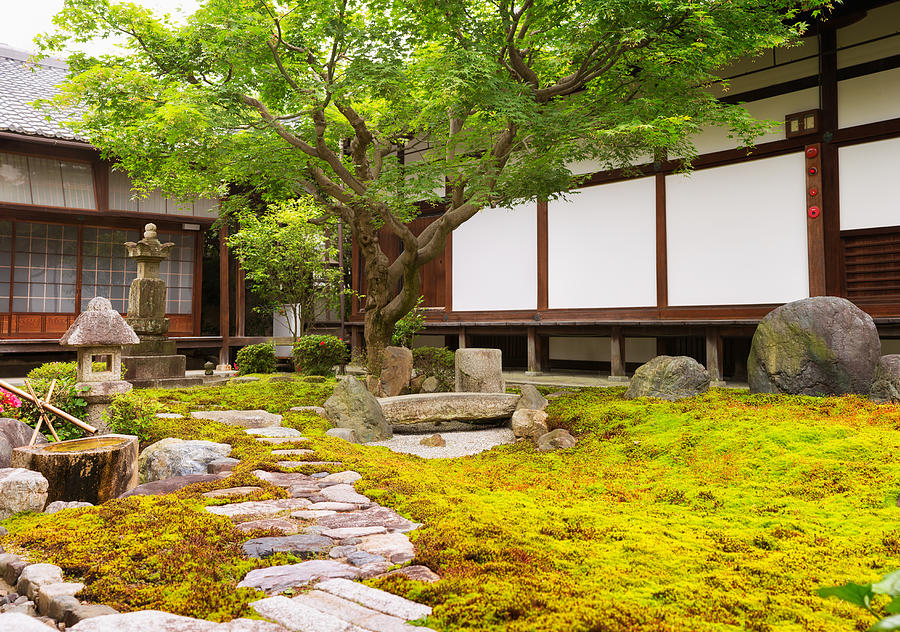 Formal rock and moss garden at Japanese Buddhist temple Photograph by NicolasMcComber
