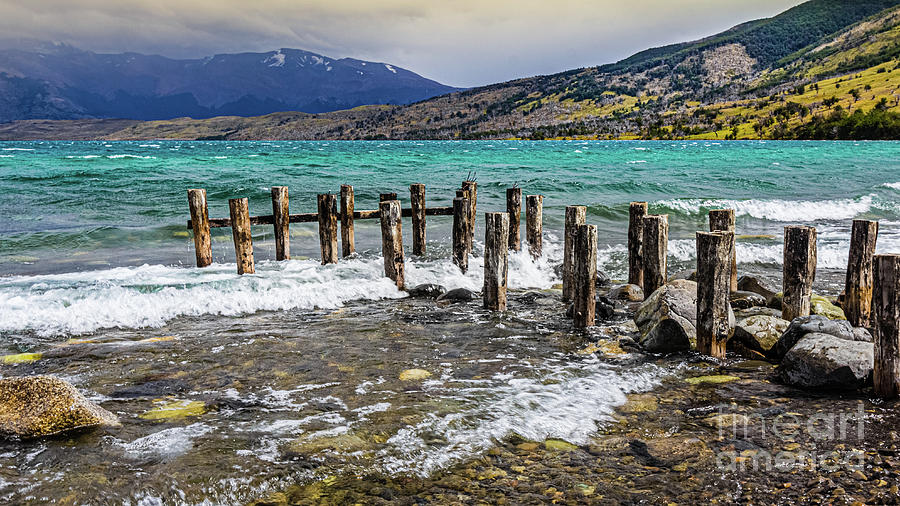 Former jetty in Laguna Azul, Chile Photograph by Lyl Dil Creations
