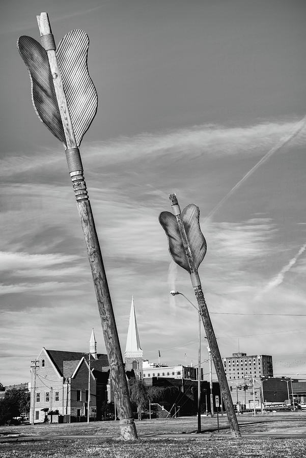 Fort Smith Wooden Arrows And Cityscape - Black and White Photograph by Gregory Ballos