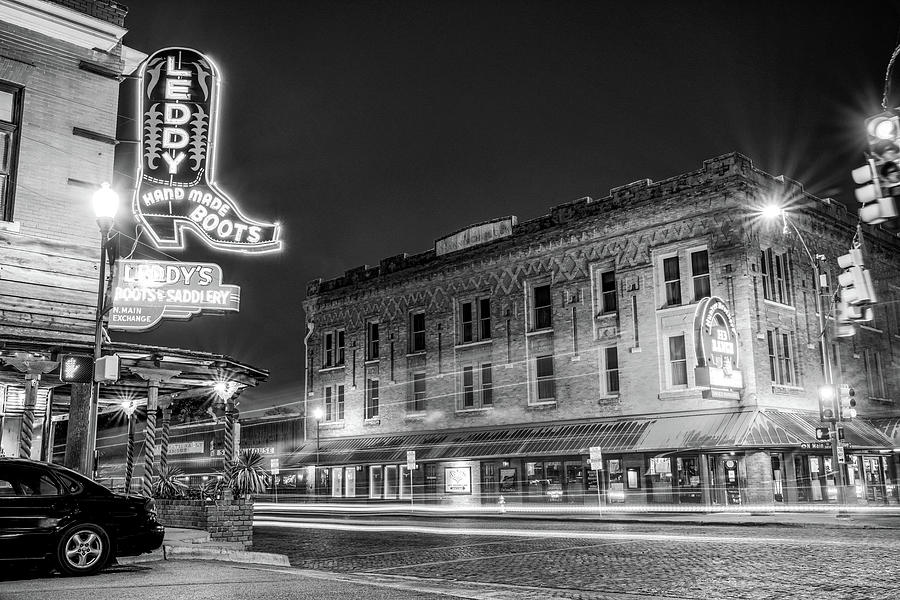 Fort Worth Stockyards Skyline And Leddy Boots Neon - Black and White Photograph by Gregory Ballos
