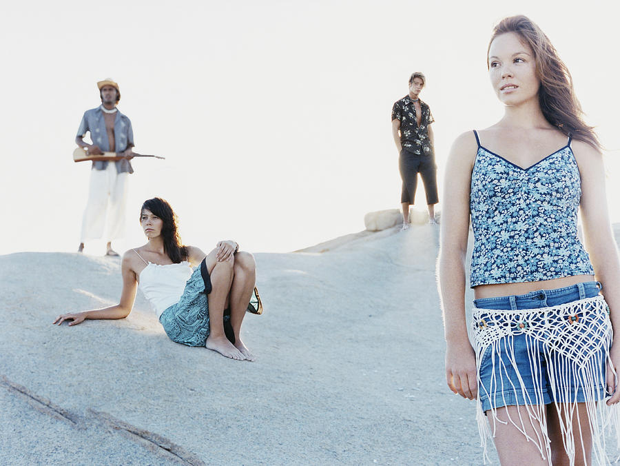 Four People in Summer Outfits on a Dune Photograph by BJ Formento