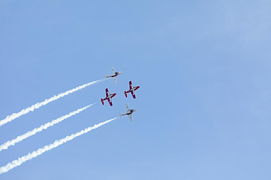 Four Snowbirds in Formation Photograph by Michael Russell