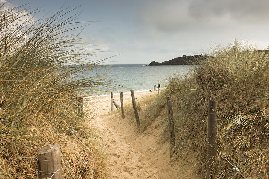 France, Bretagne, view to the sea with walkers on the beach and beach dunes in the foreground Photograph by Westend61
