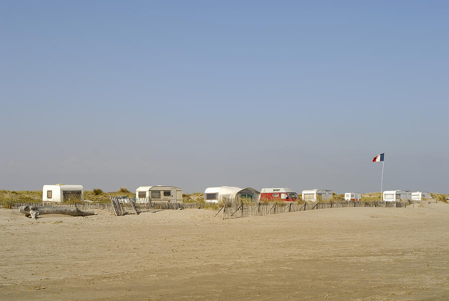 France, Camargue, caravans parked on beach Photograph by Sami Sarkis