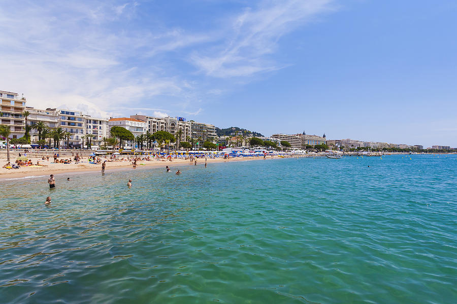 France, Cote dAzur, Cannes, tourists on beach Photograph by Westend61