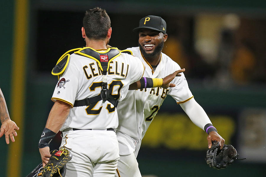 Francisco Cervelli and Gregory Polanco Photograph by Justin K. Aller