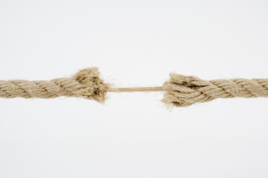 Frayed rope Photograph by Halfdark