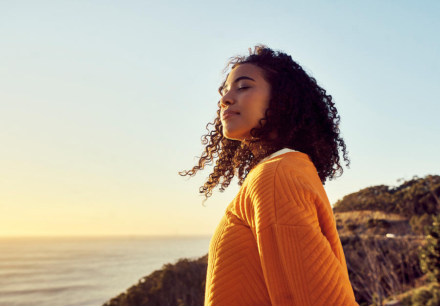 Freedom, relax and happy mindset of a woman from Brazil with sun on her face at a sea. Nature, ocean and beach water sunset with a young person feeling peace, wellness and gratitude from meditation Photograph by Pixdeluxe Freedom, relax and happy mindset of a woman from Brazil with sun on her face at a sea. Nature, ocean and beach water sunset with a young person feeling peace, wellness and gratitude from meditation Photograph by Pixdeluxe