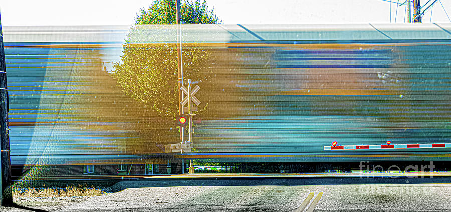 Freight Train Crossing Grade Crossing Photograph by Thomas Marchessault
