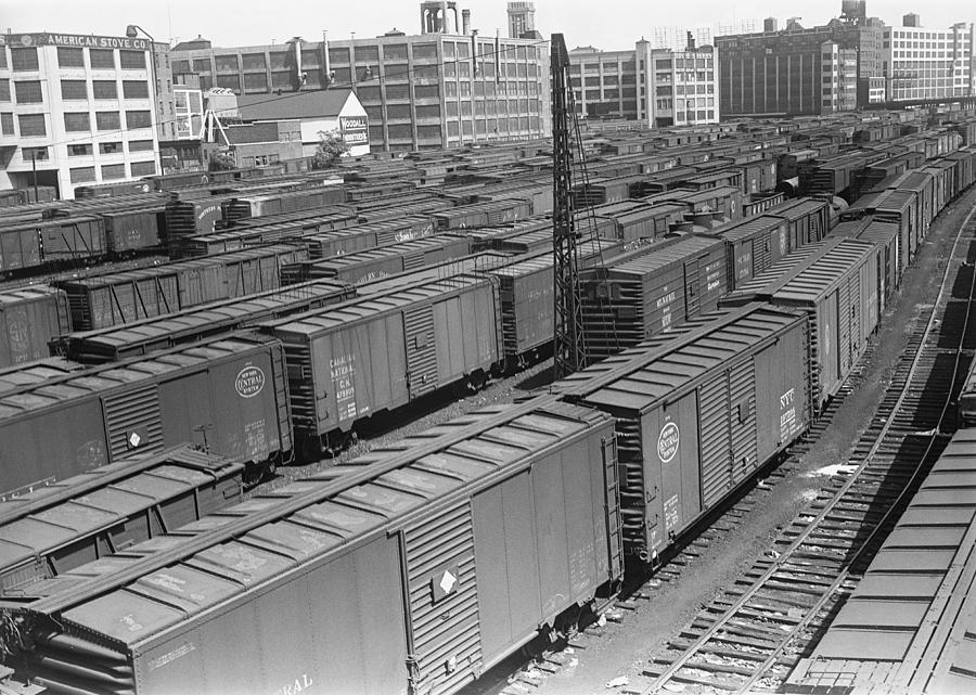 Freight trains on railroad station Photograph by George Marks