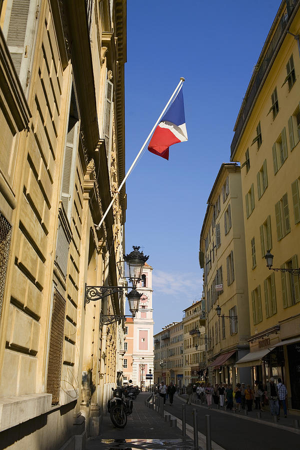French flag on a building, Nice, France Photograph by Glowimages