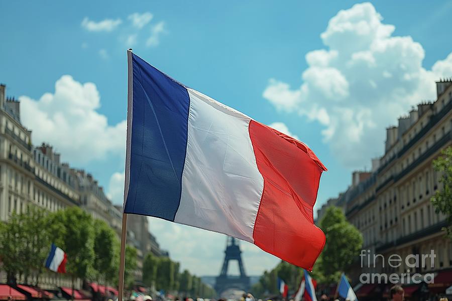 French flag proudly flying in the air in front of a building on Bastille Day, the national holiday i Photograph by Joaquin Corbalan