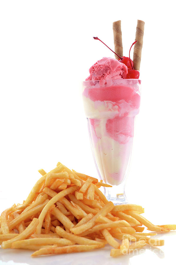 French fries and Berry Ice cream. Photograph by Milleflore Images