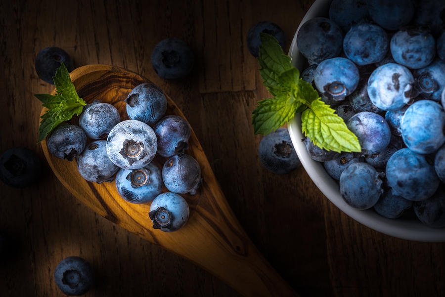 Fresh Blueberry On A Wooden Table And Bowl Photograph by Stefanocar75