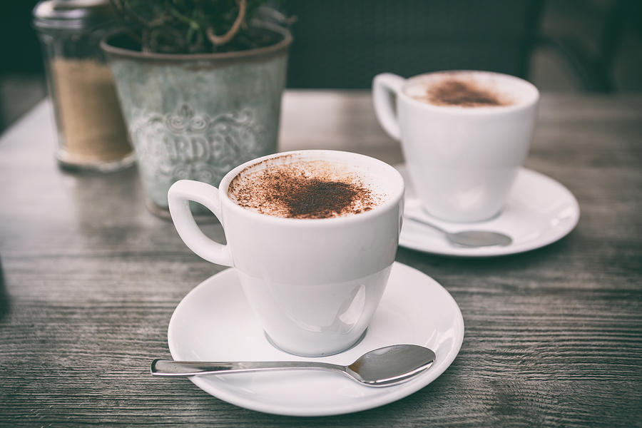 Fresh Brewed Cappuccino Coffee With Milk In A White Cup On Table Photograph by Yulia-Images