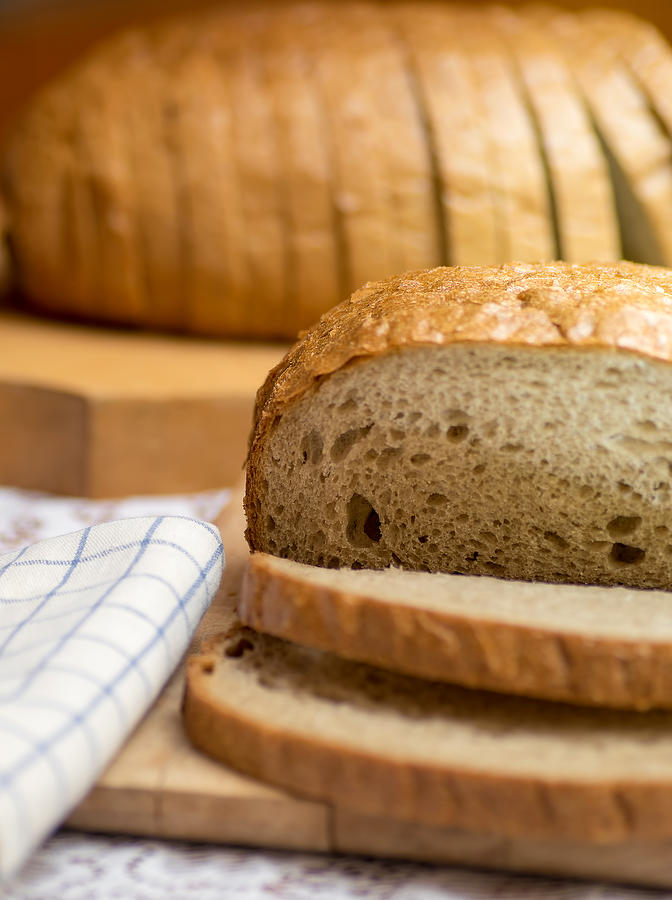 Fresh brown bread Photograph by Stanzi11
