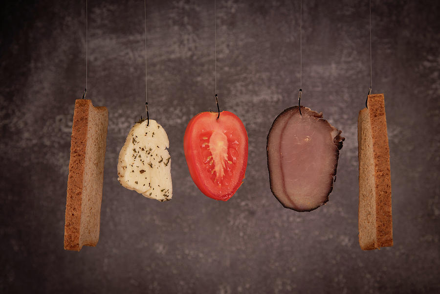 Fresh healthy sandwich ingredients. Cheese, tomato, meat, bread and halloumi Photograph by Michalakis Ppalis