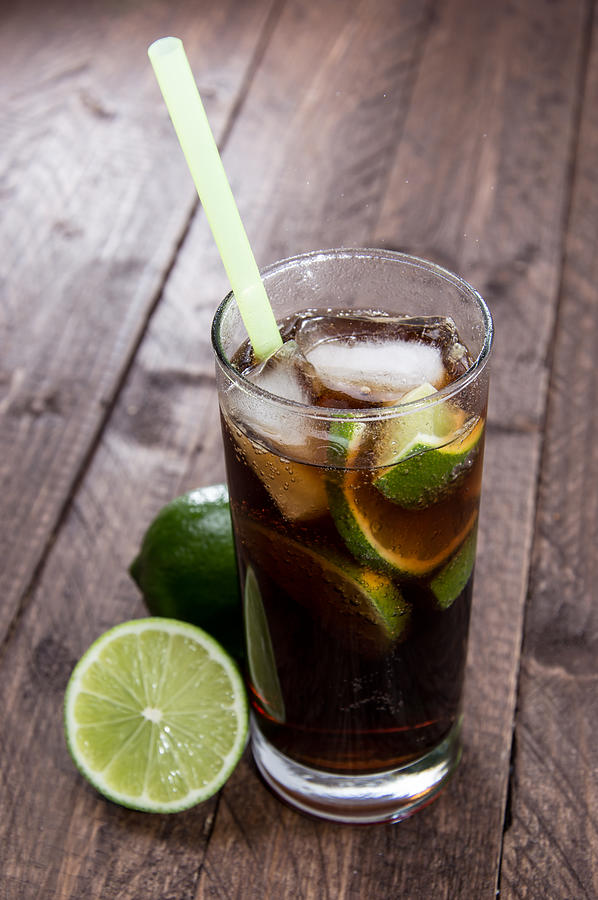 Fresh made Cuba Libre on wood Photograph by HandmadePictures
