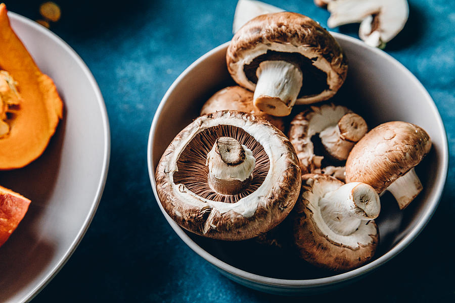 Fresh mushrooms in a bowl Photograph by Alvarez