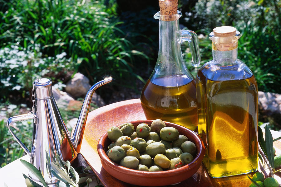 Fresh olives on table Photograph by Image Source