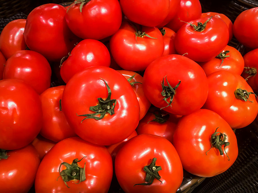 Fresh ripe tomatoes Photograph by Kanawa_Studio