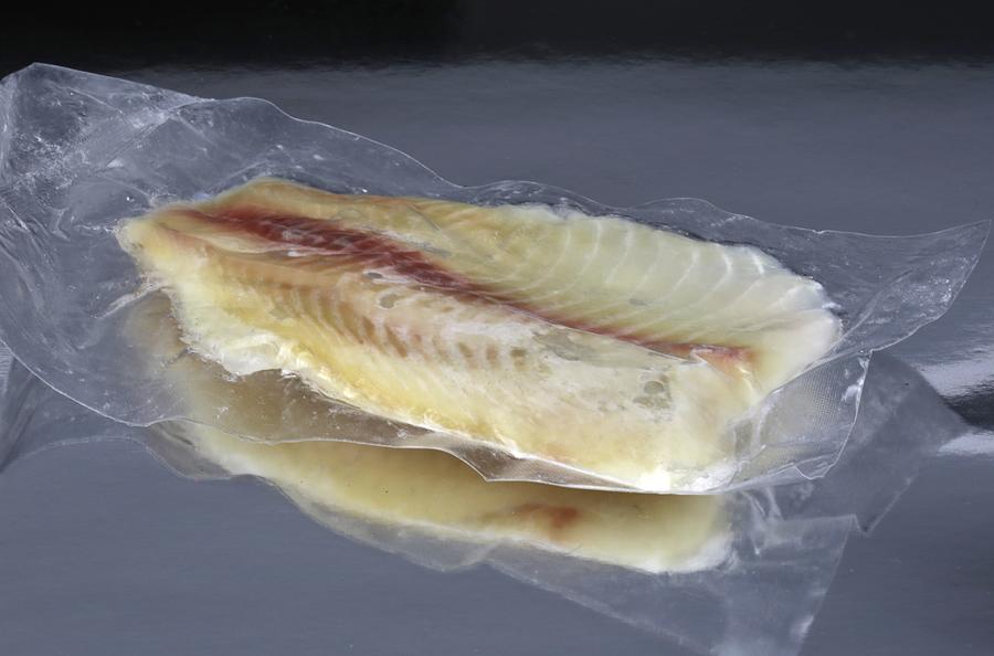 Fresh seafood sealed in a vacuum sealed container Photograph by Douglas Sacha