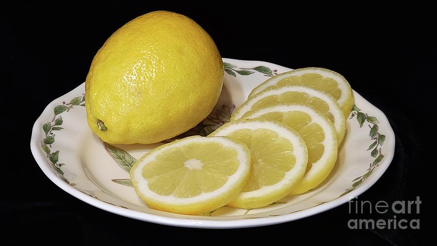 Fresh Seedless Lemons Photograph by Jeannie Rhode