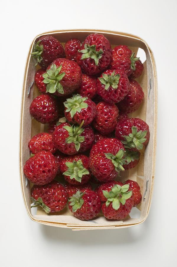 Fresh strawberries in woodchip basket Photograph by Image Professionals GmbH
