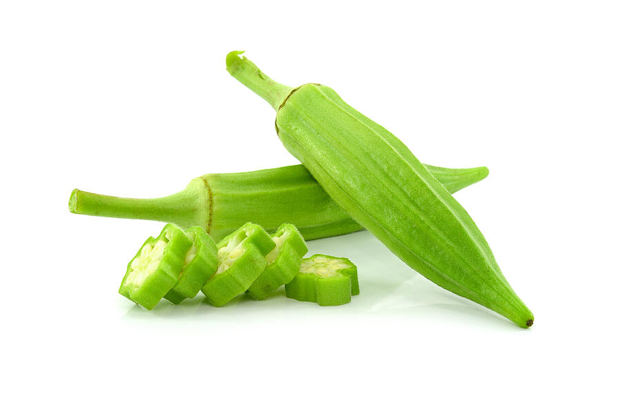 Fresh young okra isolated on white background Photograph by Portogas-D-Ace