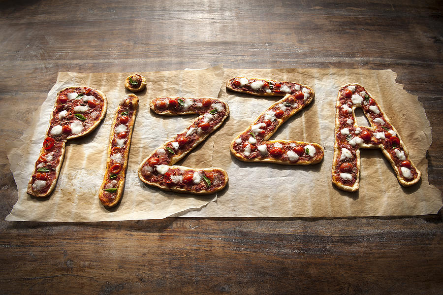 Freshly made Pizza spelling out the word pizza Photograph by Patrizia Savarese