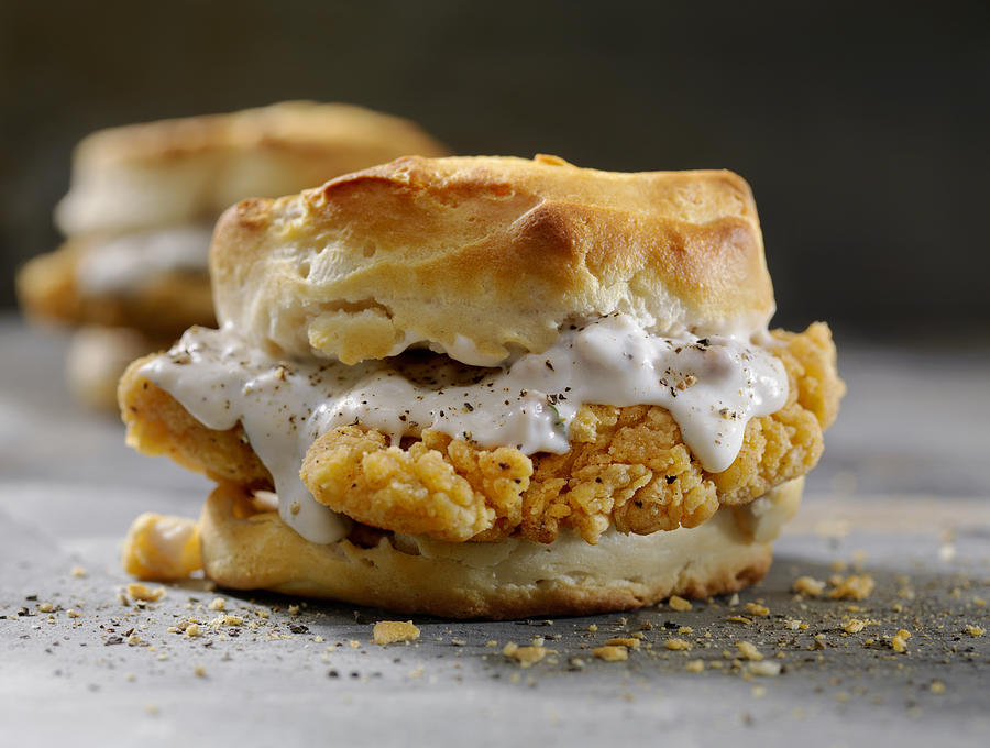 Fried Chicken Sandwich with Sausage Gravy on a Biscuit Photograph by LauriPatterson