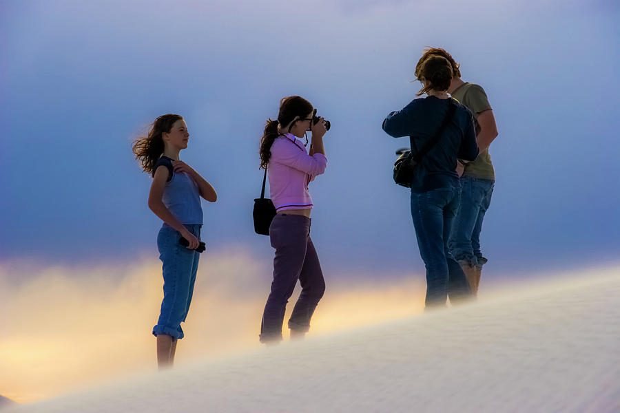 Friends at sunset in the amazing white sands. Photograph by Tommy Farnsworth