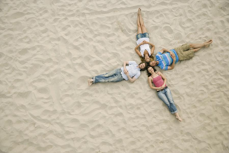 Friends on a Beach Photograph by Tomas Rodriguez