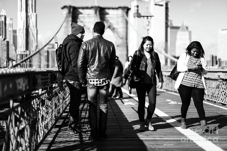 Friends on the Brooklyn Bridge in New York City Photograph by John Rizzuto