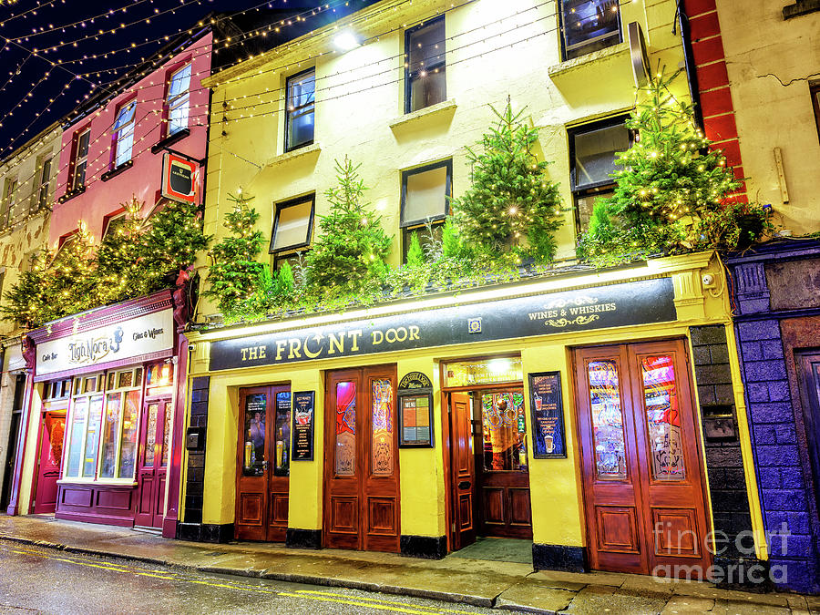 Front Door at Night in Galway Photograph by John Rizzuto