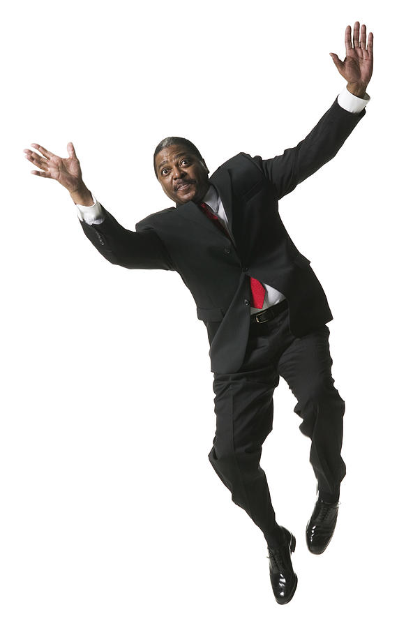 Front view of a businessman jumping Photograph by Photodisc