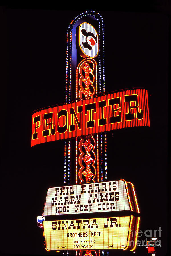 Las Vegas Photograph - Frontier Casino Neon Sign at Night  by Aloha Art