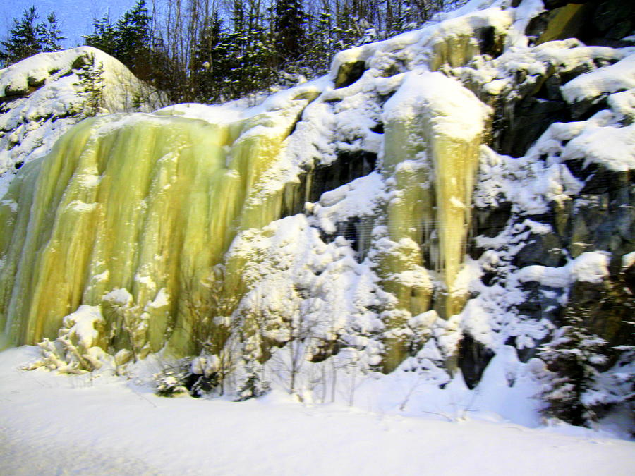 Frosen waterfall Photograph by Pauli Hyvonen