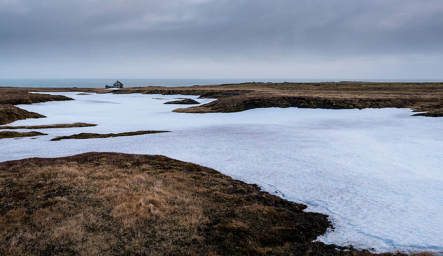 Frozen lake and meadow with snow Iceland Photograph by Michalakis Ppalis