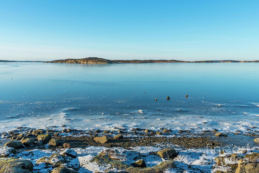 Frozen ocean in winter Photograph by JazzaIndigi