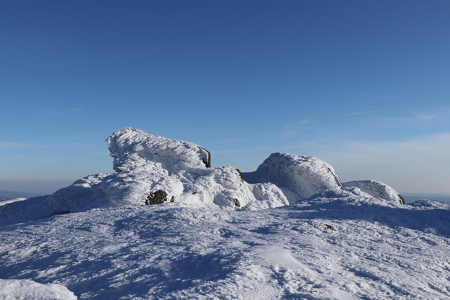Frozen stones in the middle of nowhere with wonderful and clear sky. Top of the highest mountain in Low Tatras Dumbier. View on high Tatras. Cold temperature. Concept of frozen nature Photograph by Vaclav Sonnek